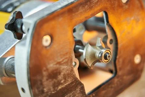 Close-up decorative milling cutter for processing wooden parts installed in a Stock Photos