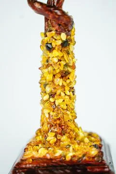 Close-up of a decorative tree trunk made of amber Stock Photos