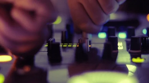 Close up of dee jay hands mixing in nightclub Stock Footage 106099481