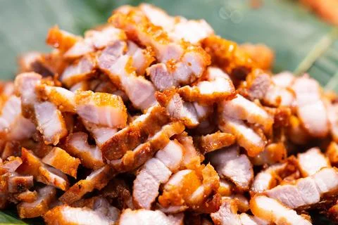 Close up of Deep fried pork belly, thai street food market Stock Photos