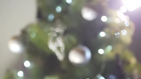 Close up defocus view on beautiful Christmas tree decoration sparkling bright li Stock Footage 132676644