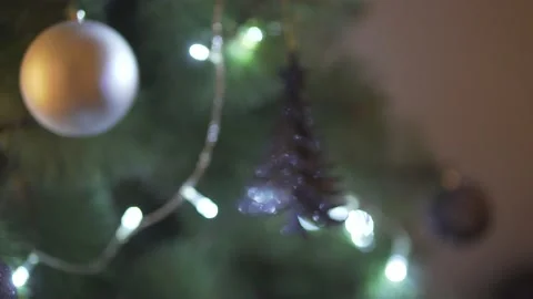 Close up defocus view on impressive Christmas tree decoration sparkling bright l Stock Footage 132676636