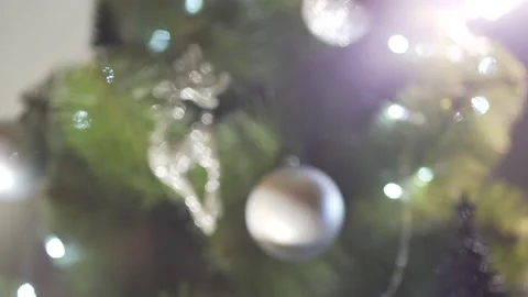 Close up defocus view on marvelous Christmas tree decoration sparkling bright li Stock Footage 132676635