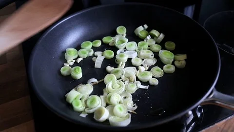 Close up of delicious leek on pan Stock Footage 74858483