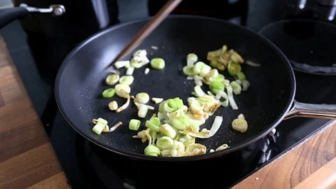 Close up of delicious leek on pan Video stock 74858613
