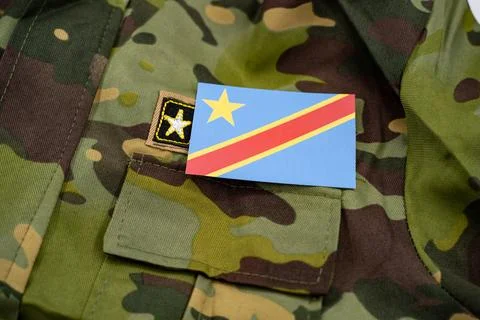 Close up of Democratic Republic of the Congo flag on military camouflage uniform Stock Photos