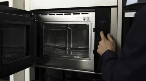 Close up of demonstrating the space inside the empty microwave oven. Household Stockfoto's