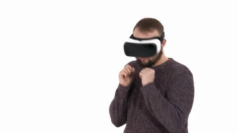 Close-up demonstration of a man in virtual reality glasses imitates box Stock Footage 121198655