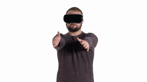 Close-up demonstration of a young bearded man dancing in funny manner while Stock Footage 121199567