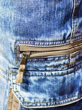 Close-up of denim trousers with patch pockets with zip image patch pocket ... Stock Photos