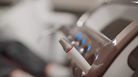 Close up dental instruments including orthodontic handpiece on sterilization Stock Footage 345075660