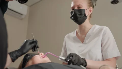 Close up dental professional using specialized tools for patient orthodontic Vídeos de archivo 345834613