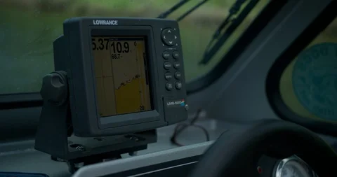 Close up of depth finder or fish finder with GPS on fishing boat with hand Stock Footage 111363098