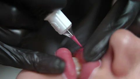 Close-up dermapigmentation with microblading pen of female lips in beauty spa Stock Footage 201946917