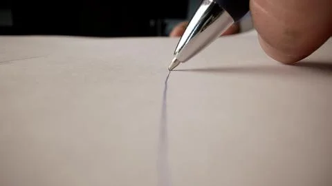 Close-up of a design engineer's hand with a pen in his hands against the ba.. 스톡 사진