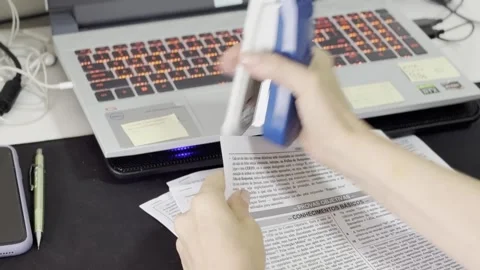 Close-up, desk accessories, laptop computer, document stapler Stock Footage 303529261