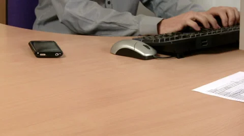Close up of desk, man typing and folder Stock Footage 30445381