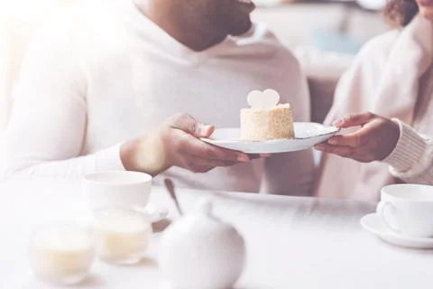 Close up of dessert being in both hands Stock Photos