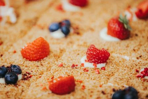 Close-up of dessert featuring layers of crumbly texture topped with fresh s.. Stock Photos