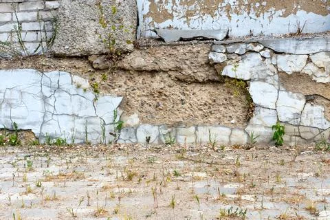 Close-up: destroyed concrete foundation. Stock Photos