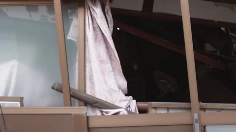Close-up of Destruction and Debris in a Damaged Building Vidéo 336565575