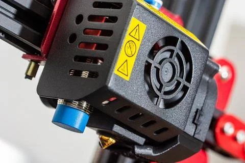 Close-up detail of 3D printer printerhead with hotend and fan. Isolated on white Stock Photos