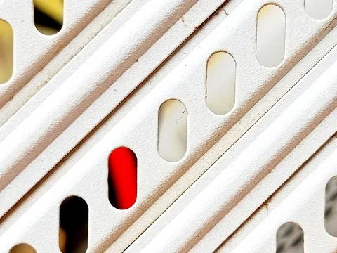 Close-Up Detail of Computer Case Vented Metal Panel with Slots and Texture Stock Photos