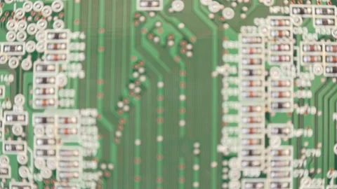 Close-up detail of electrical circuits on computer mainboard Stock Footage 261541874