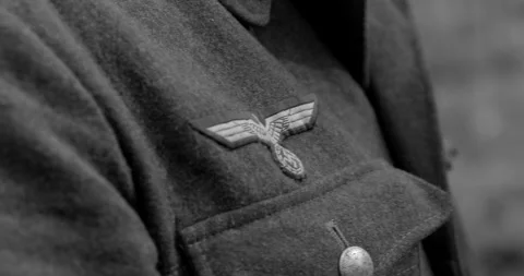Close up detail german eagle Patch on German soldiers World War II times uniform Stock Footage 169748805
