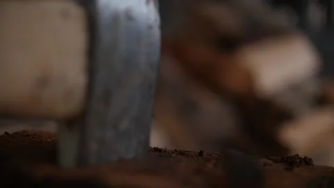 Close up detail of the head of an axe stuck in wood Stock Footage 153521818