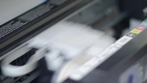 Close up detail of inside working Epson printer while printing Stock Footage 274615140