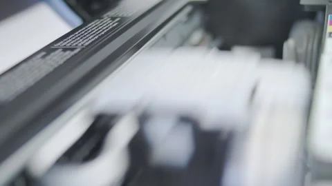 Close up detail of inside working Epson printer while printing Stock Footage 274615791