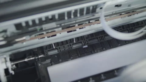 Close up detail of inside working Epson printer while printing Stock Footage 274616465