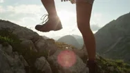 Close Up: Detail Of Leather Mountain Shoes And Woman Climbing Steep Mountaintop Stock Footage