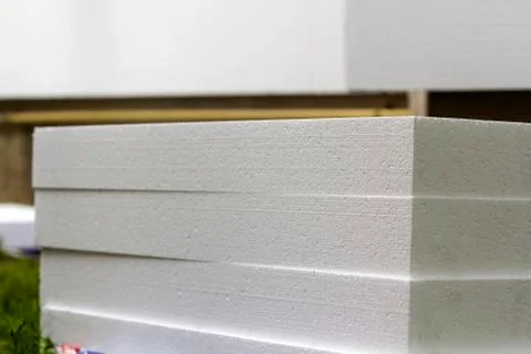 Close-up detail of stack of white rigid polyurethane foam sheets for house in 스톡 사진