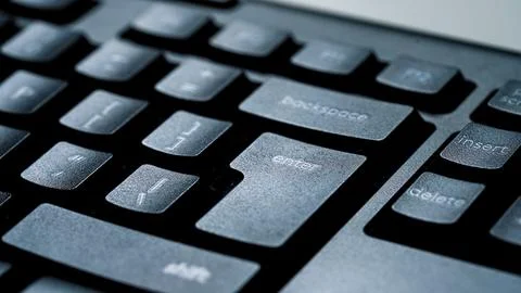 Close up detail view of desktop computer keyboard. Stock Photos