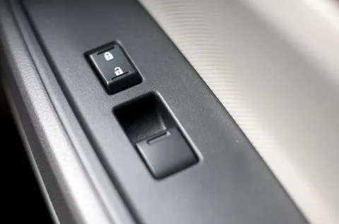 Close up detail of window control button inside a car Stock Photos