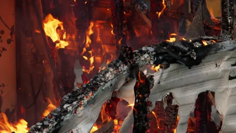Close up detailed shot of flames in a small building. Footage of fire, embers Stock Footage 232337013