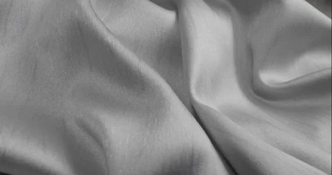 Close-up of detailed silver fabric. Dolly shot Stock Footage 338443899