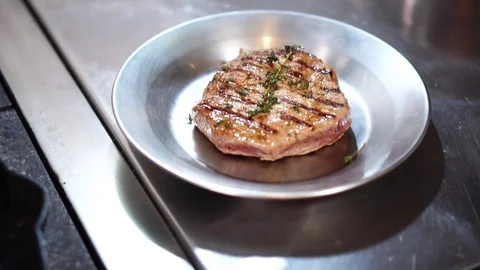 Close up detailed view on delicious beef steak thick piece of grilled meat Stock Footage 105895695