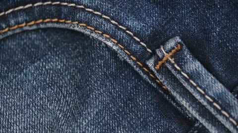 Close up details and elements of jeans, rotation. macro video of jeans. Stock Footage 241010847