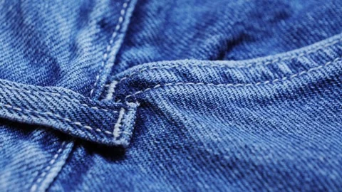 Close up of details and elements of jeans. Macro footage of stitched seams Stock Footage 315573168