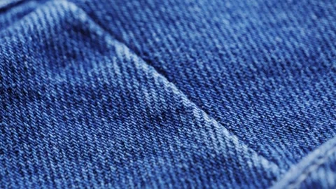 Close up of details and elements of jeans. Stitched seams. Texture of fabric Stock Footage 316215443