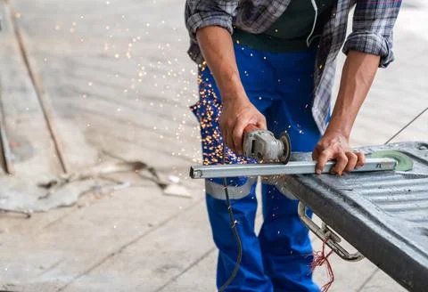 Close-up details of construction engineer worker cutting steel bars. Stock Photos