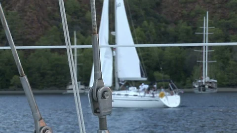 Close up details of deck and white sail of moving sailing yacht. 動画素材 118801559