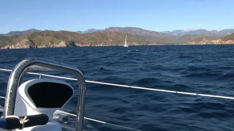 Close up details of deck and white sail of moving sailing yacht. 動画素材 118801597