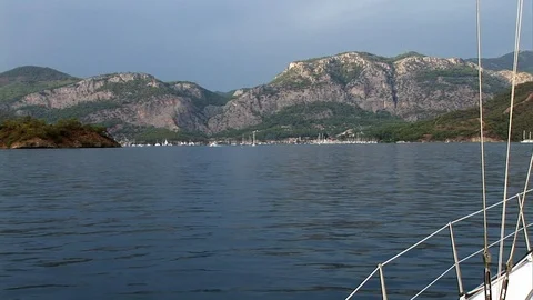 Close up details of deck and white sail of moving sailing yacht. 動画素材 118801608