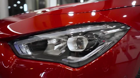 Close up of details of headlights of anonymous prestigious black luxury modern Stock-Footage 164997119