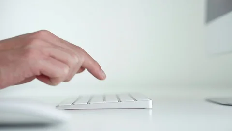 Close up details man hands typing on white keyboard. Enter, buy, pay, search Stock Footage 93047429