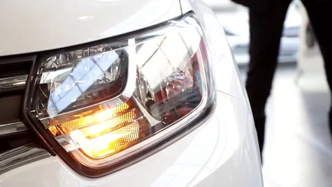 Close up of details of switched on headlights. Stock Footage 137277302